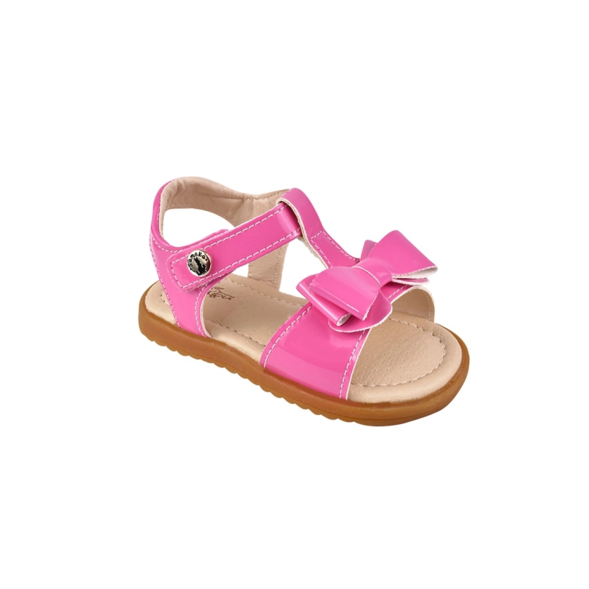 Na imagem temos uma linda Sandália primeiros passos com laço na cor Pink