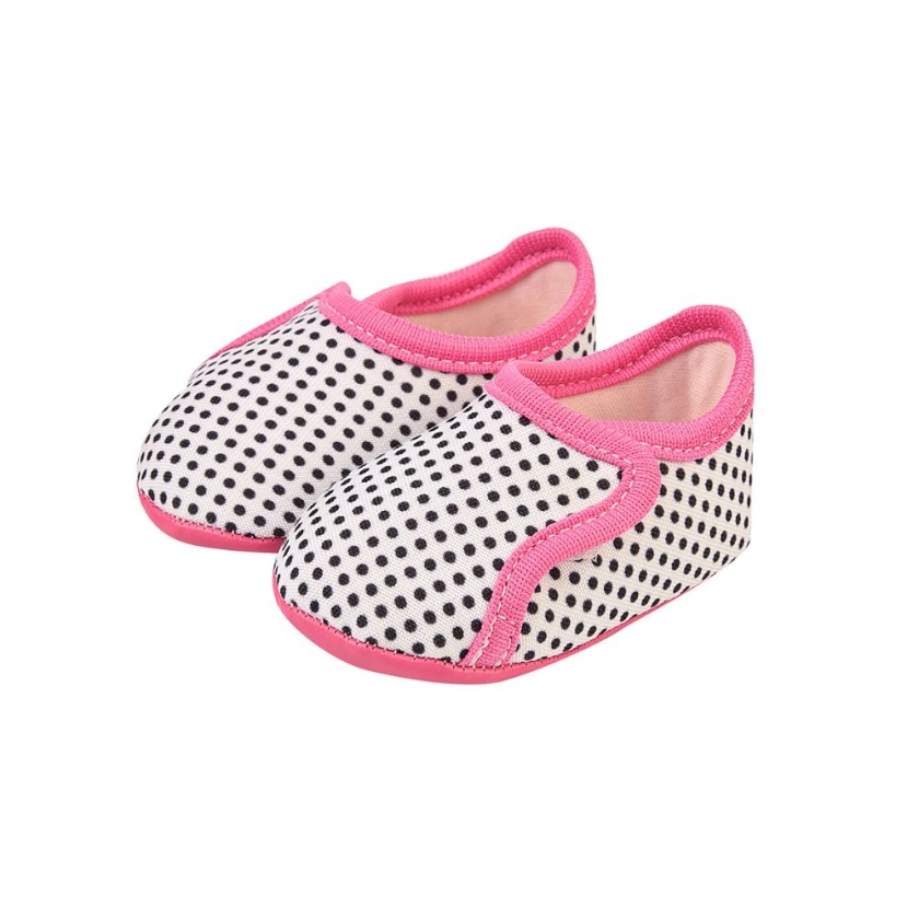 Na foto temos um lindo sapatinho de bebe super confortável feito em tecido, nas cores branco e rosa com detalhe em bolinhas pretas, Vem conferir!